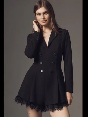 Lace trim black romper from Anthropologie